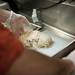 Holiday's Owner Rob TerBush sliced turkey on Monday. TerBush says they will cook 20 turkeys to be served on Thanksgiving. Daniel Brenner I AnnArbor.com